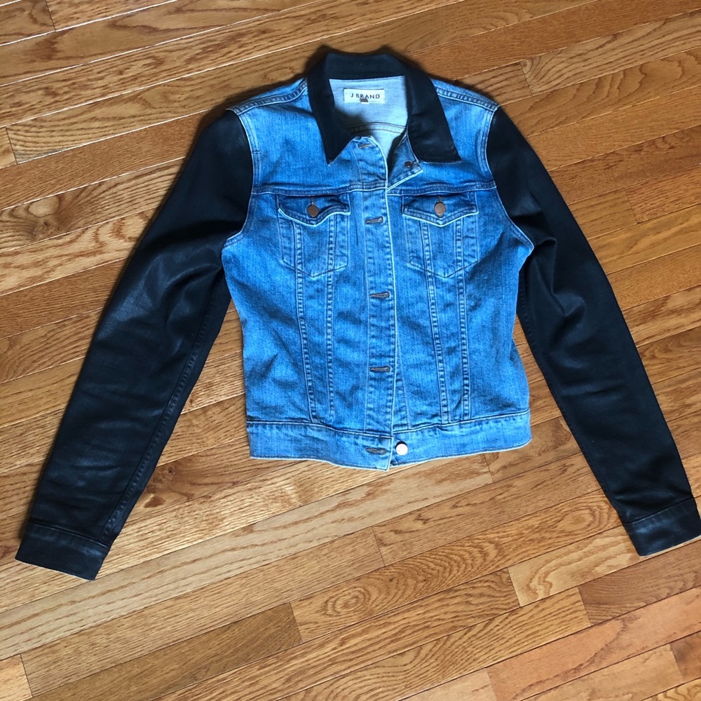 Denim jacket with waxed black sleeves